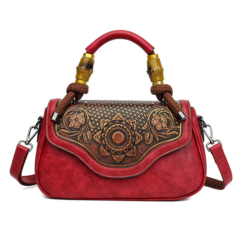 Handcrafted Leather Crossbody Bag with Embossed Retro Design