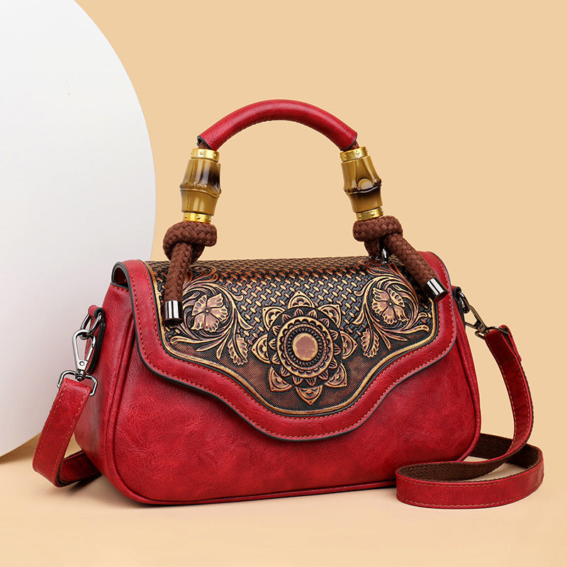 Handcrafted Leather Crossbody Bag with Embossed Retro Design