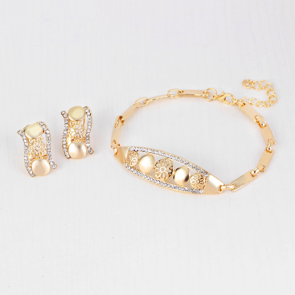 Women's Gold Jewelry Set with Necklace, Earrings, Bracelet, and Ring