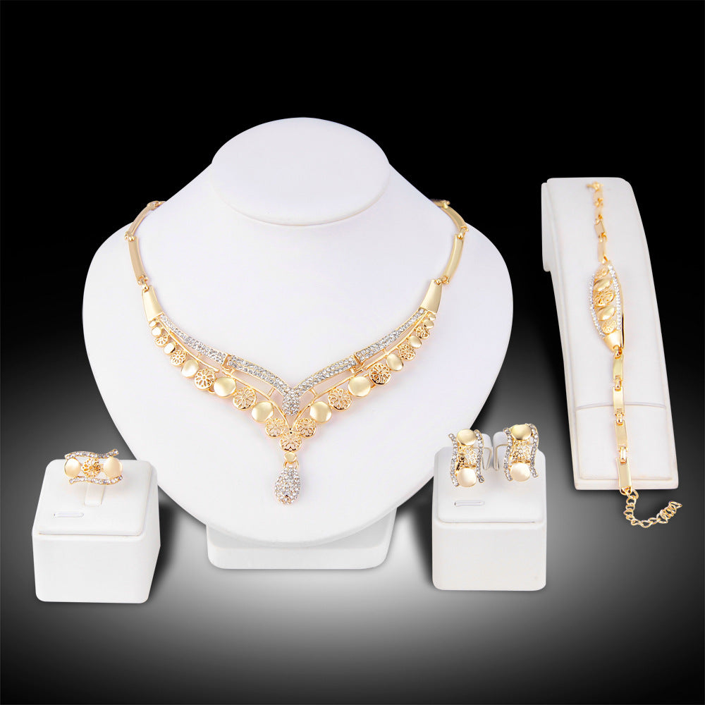 Women's Gold Jewelry Set with Necklace, Earrings, Bracelet, and Ring