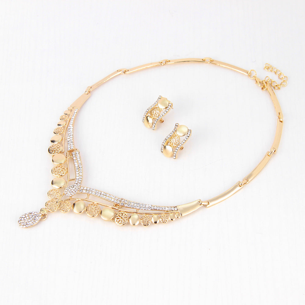 Women's Gold Jewelry Set with Necklace, Earrings, Bracelet, and Ring