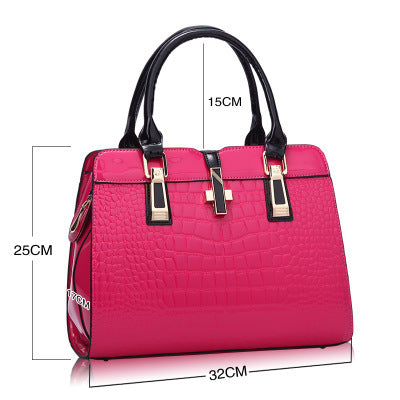 Bolso de mano de lujo con estampado de cocodrilo y múltiples opciones de color.