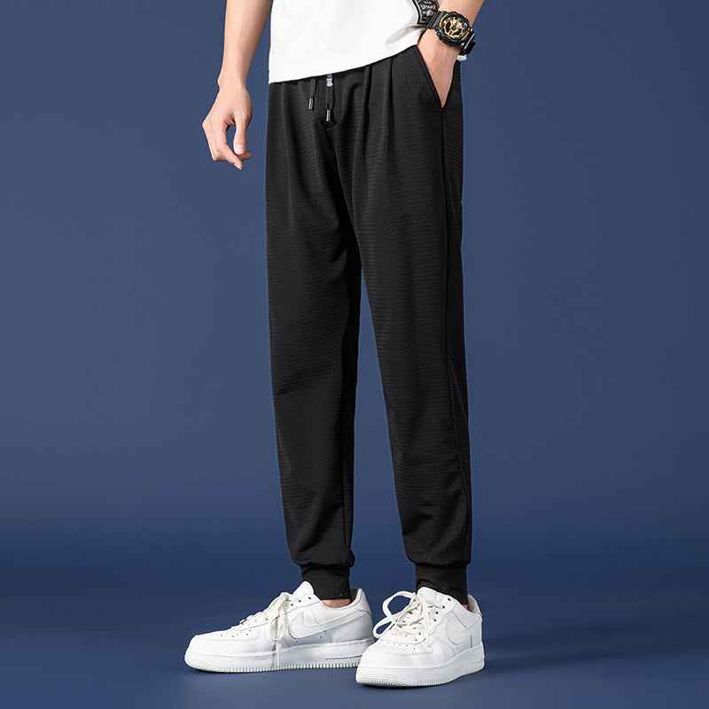 Nine Point Drawstring Sweatpants with Wide Leg Design