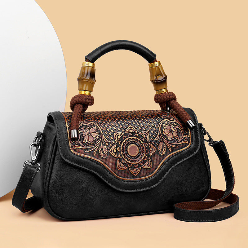 Handcrafted Leather Crossbody Bag with Embossed Retro Design
