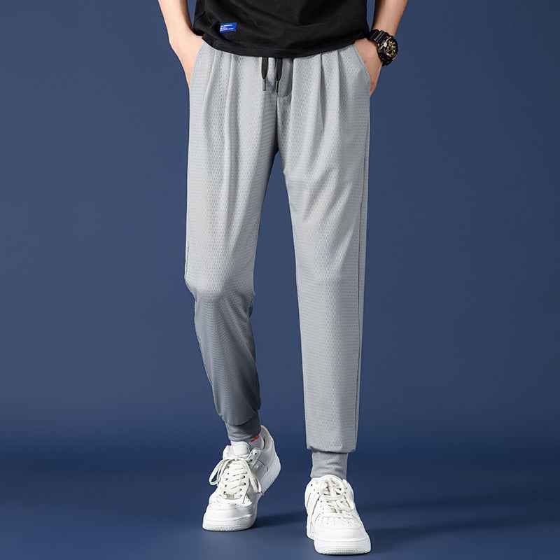 Nine Point Drawstring Sweatpants with Wide Leg Design