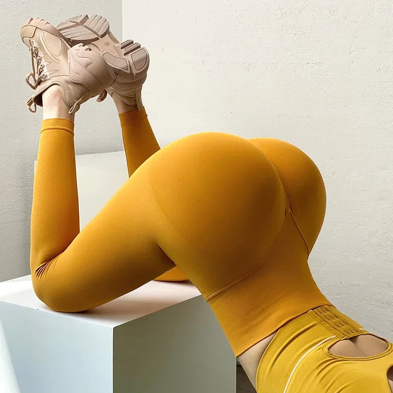 Mallas elásticas de talle alto y cintura alta para fitness y yoga. 