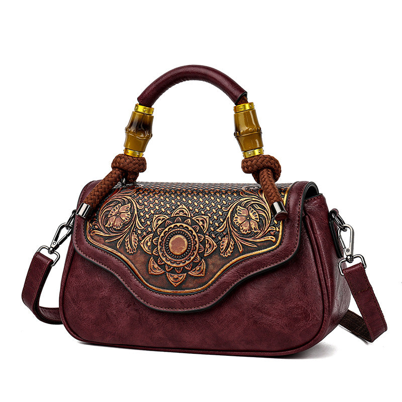 Handcrafted Leather Crossbody Bag with Embossed Retro Design