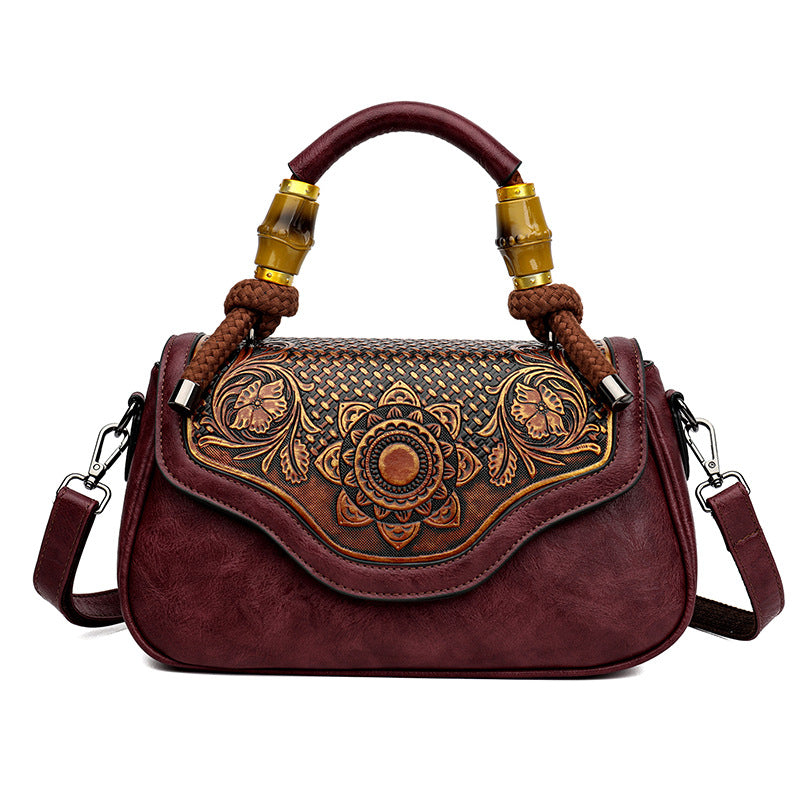 Handcrafted Leather Crossbody Bag with Embossed Retro Design