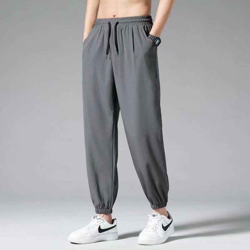 Nine Point Drawstring Sweatpants with Wide Leg Design