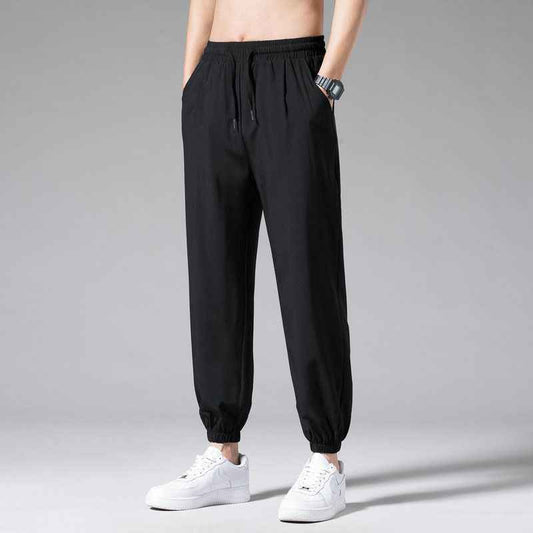 Nine Point Drawstring Sweatpants with Wide Leg Design